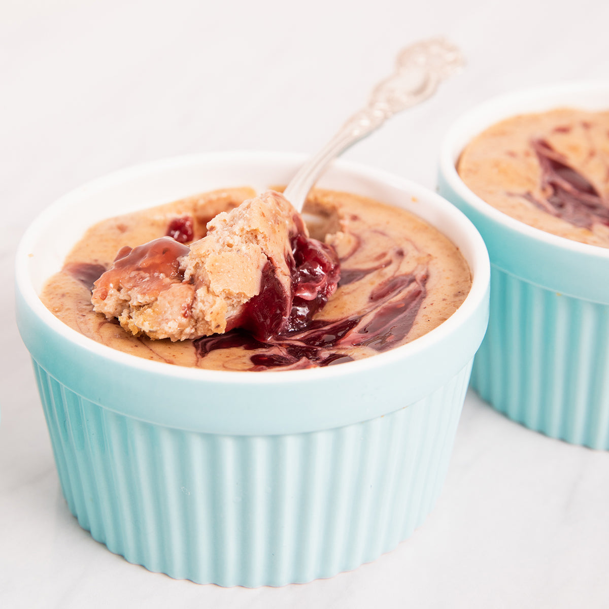 Walnut Butter Cheesecake with Raspberry Swirl