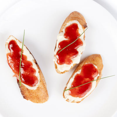 Fire-Roasted Brie Crostini with Strawberry & Rose